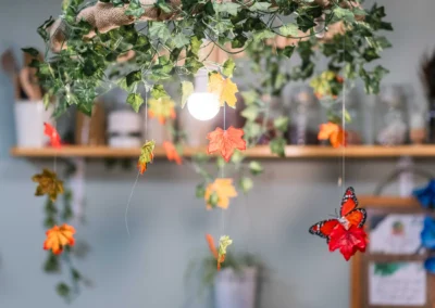 Decorated classroom with autumn leaves photographed during a nursery photography session for marketing brochures in Halifax, West Yorkshire