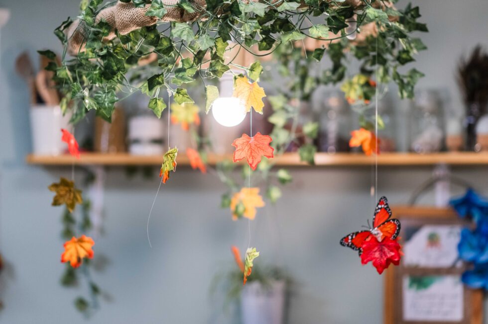 Decorated classroom with autumn leaves photographed during a nursery photography session for marketing brochures in Halifax, West Yorkshire
